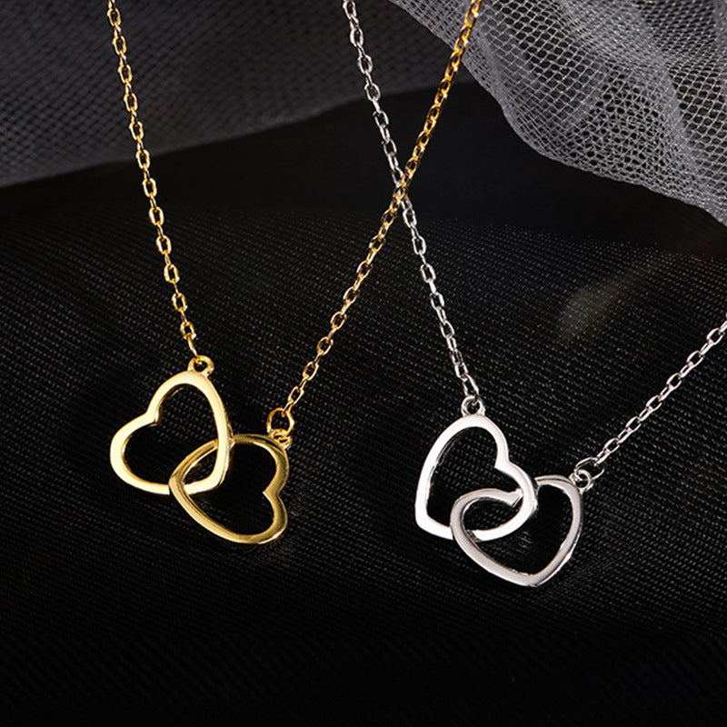 Doppelherz Halskette – Verschlungene Herzen | Gold & Silber