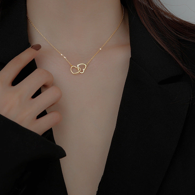 Doppelherz Halskette – Verschlungene Herzen | Gold & Silber