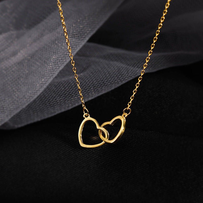 Doppelherz Halskette – Verschlungene Herzen | Gold & Silber